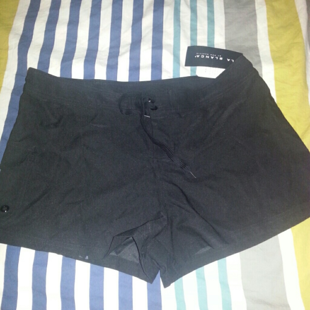 Black board shorts